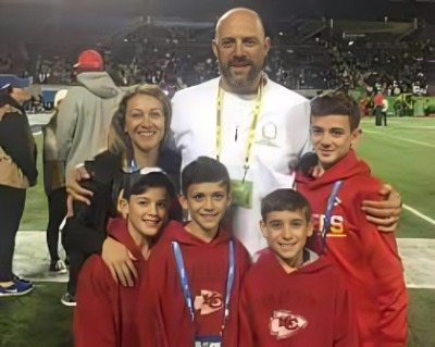 Matt Naggy's supportive wife and children are in the ground with the former quarterback.